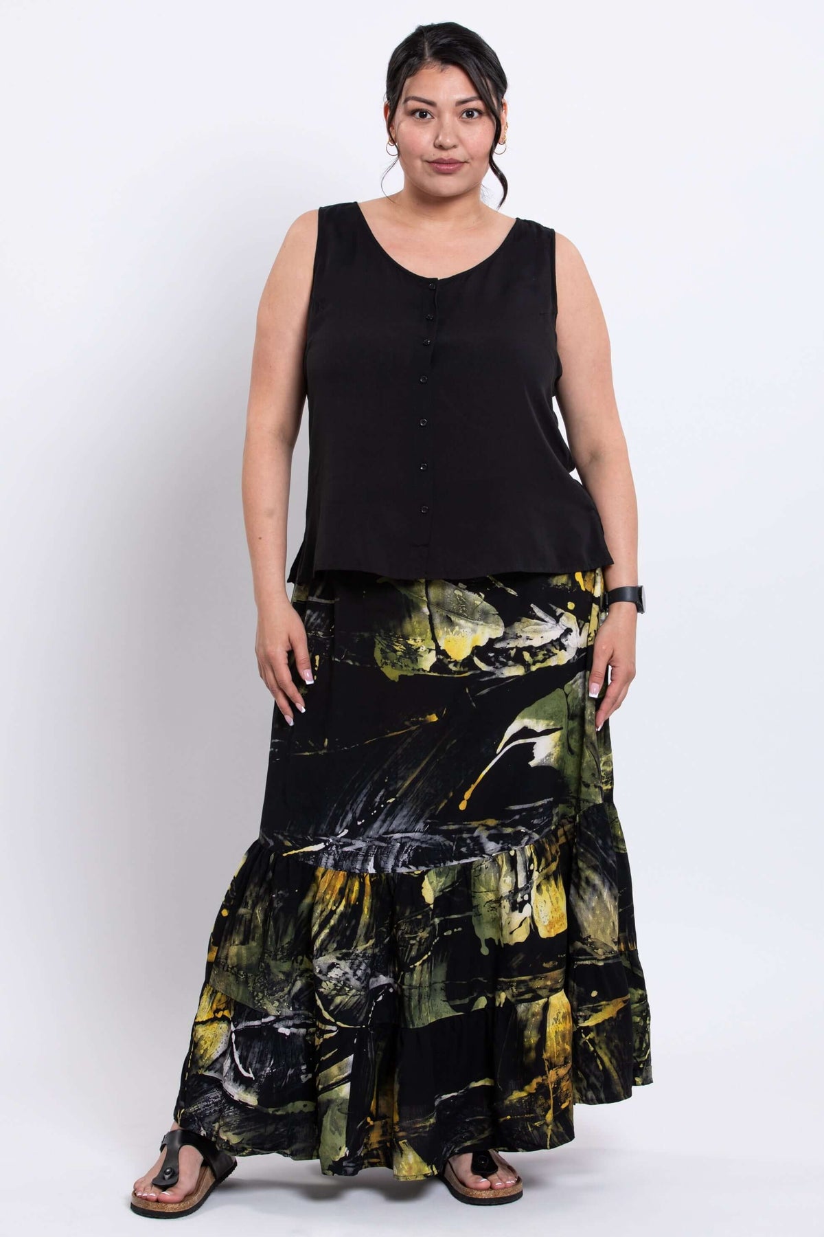 Full front view of model in Tibby skirt highlighting the flowy, multi-tiered construction