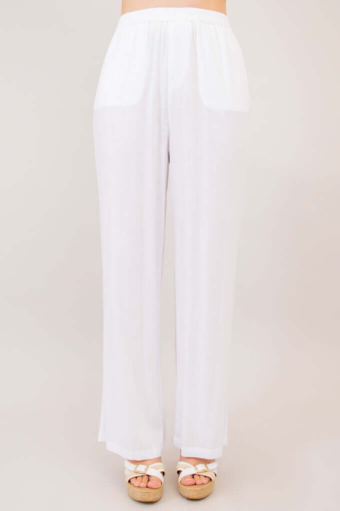 Full front view of white linen-bamboo pants with elastic waistband
