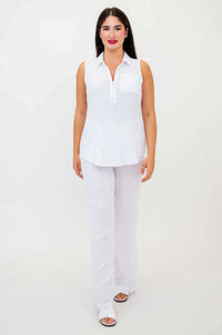 Full frontal view of woman modeling sleeveless white tank top and matching pants