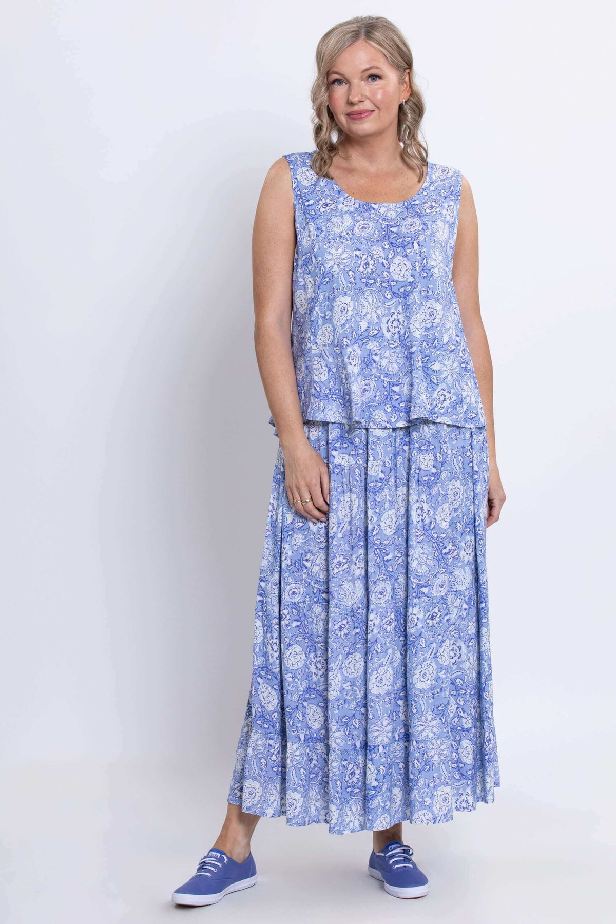 Full length view of woman in periwinkle floral Ginny Tank and coordinating skirt