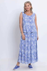 Full length view of woman in periwinkle floral Ginny Tank and coordinating skirt