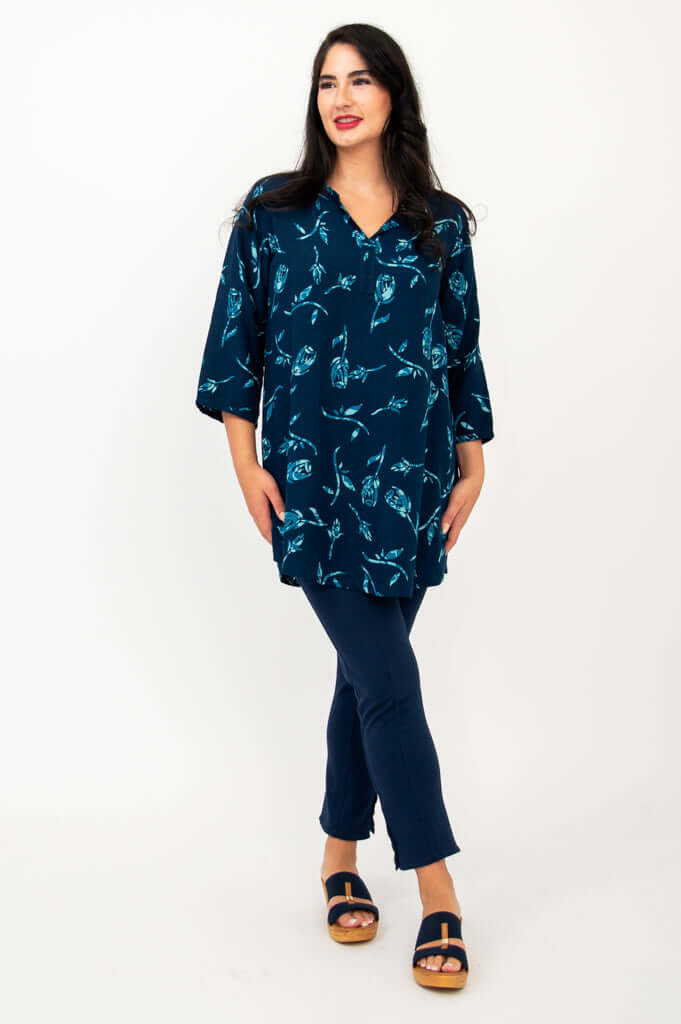 Full body view of model in Kary Tunic Top and navy capri pants