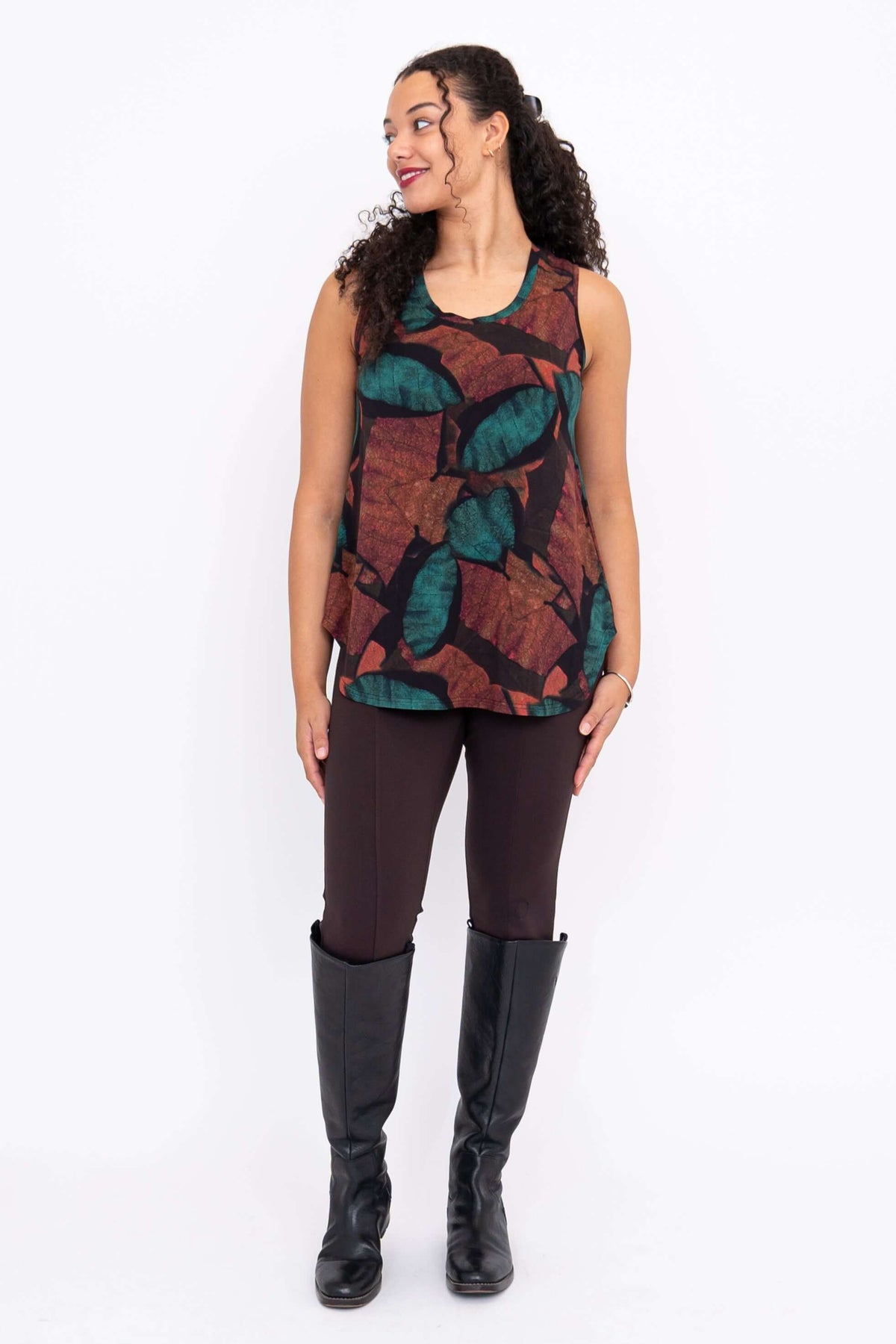 Full body front view of model in Jazz tank top and brown pants with boots
