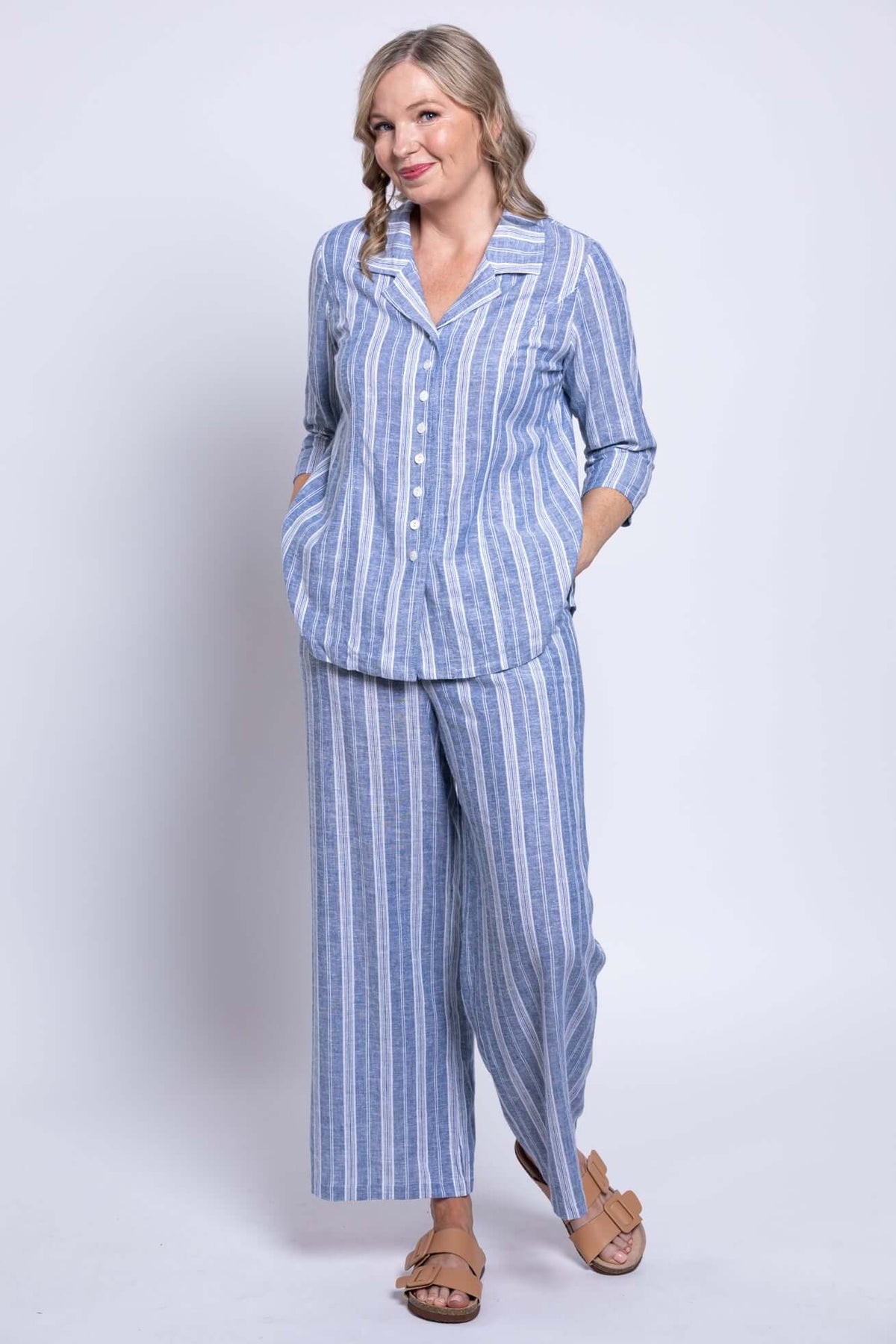 Full outfit view of Parker blue striped wide-leg pants and button-up shirt