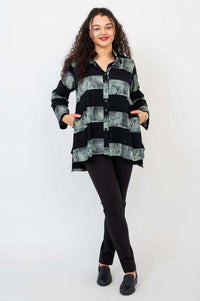 Full body front view of model in Talina Batik Stripe Blouse and black pants