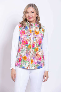 Front view of woman wearing a Hartford Pink Print Vest with vibrant floral pattern