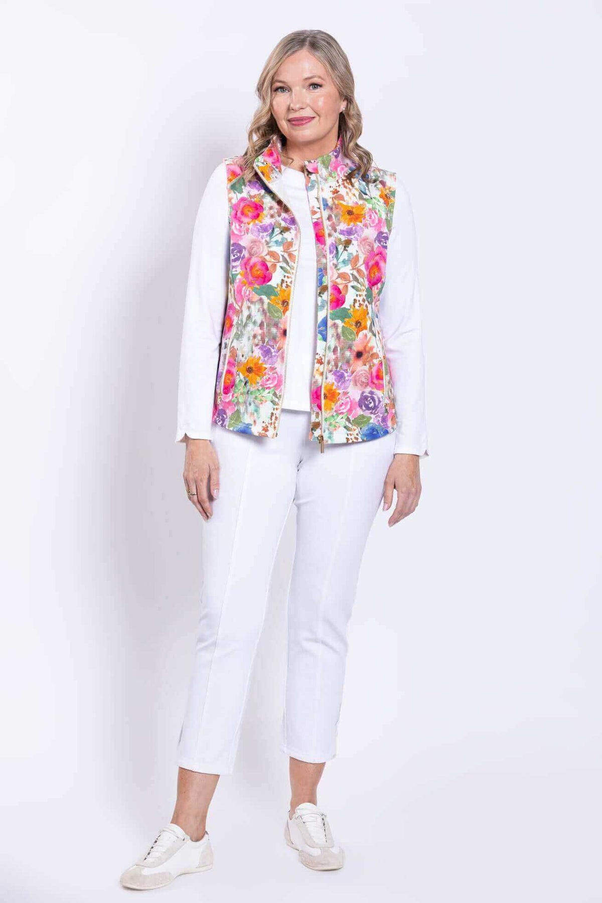 Full body front view of woman wearing Hartford Pink Print Vest and casual white outfit