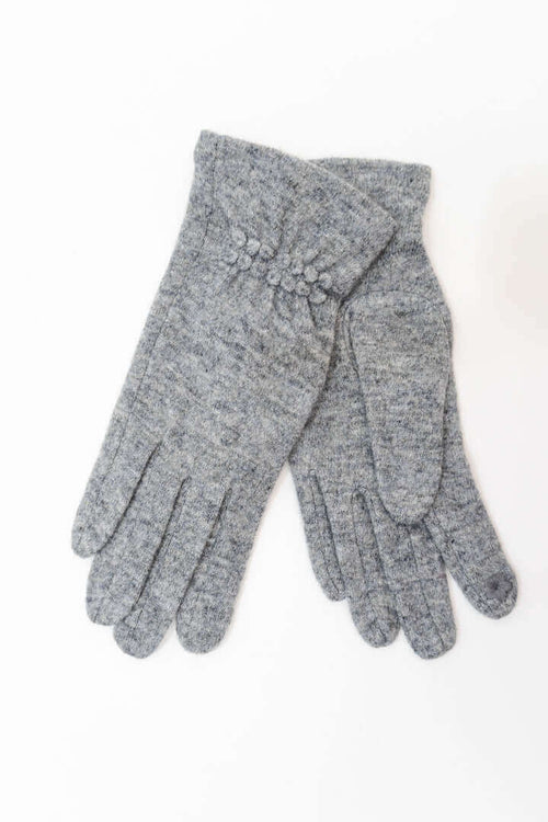 Pair of heathered gray wool gloves with gathered cuff detail on a white background