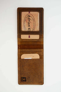 Interior of brown wallet showing card slots and ID window