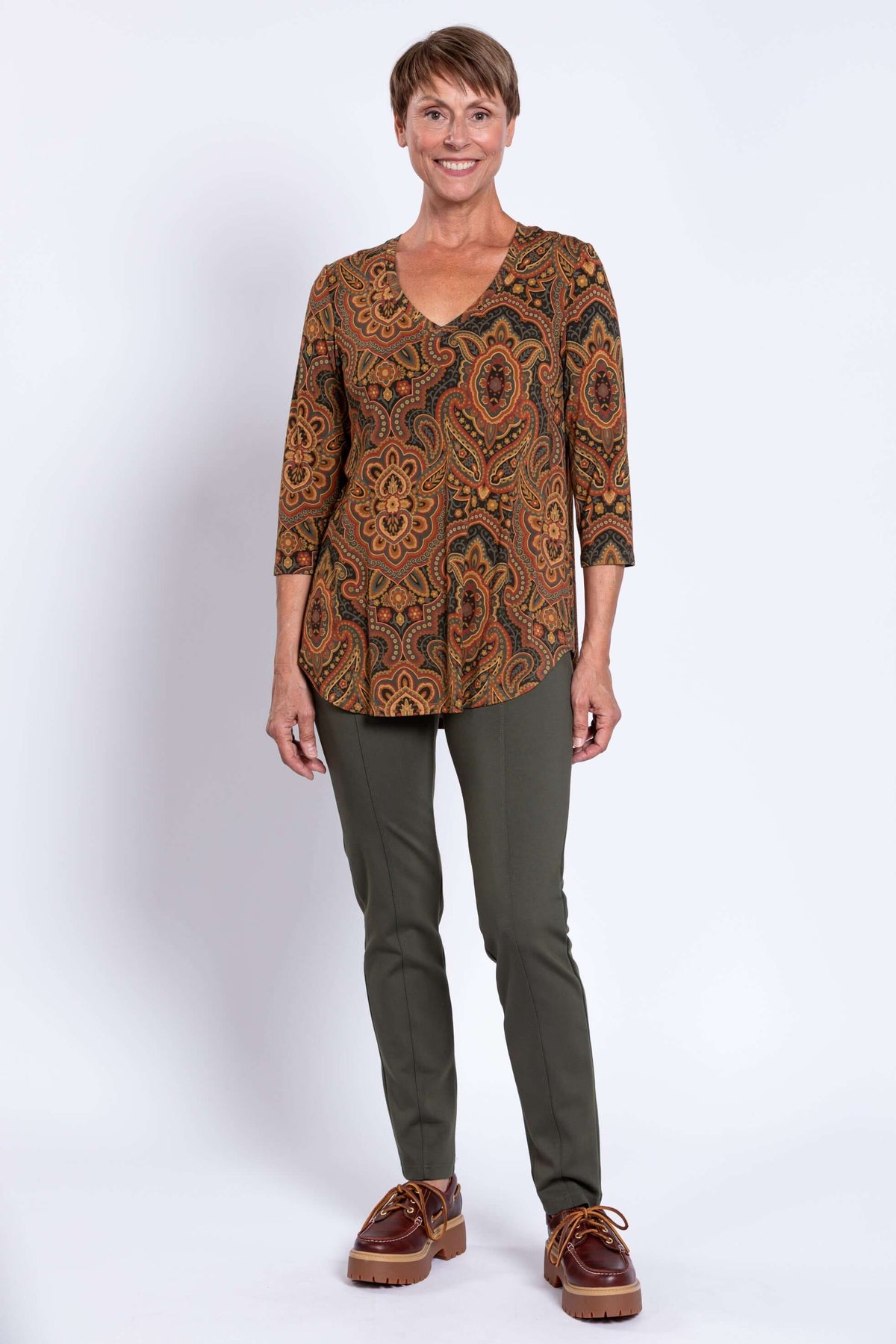 Full body front view of Jackie V-neck bamboo top in paisley print and green pants