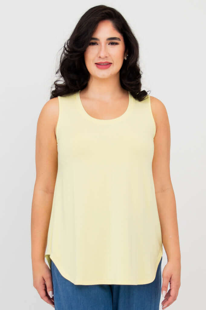 Front view of model wearing lemon yellow bamboo tank top with round neckline