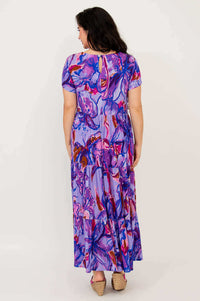 Back view of the Laurita Maxi Dress displaying button keyhole and floral print details