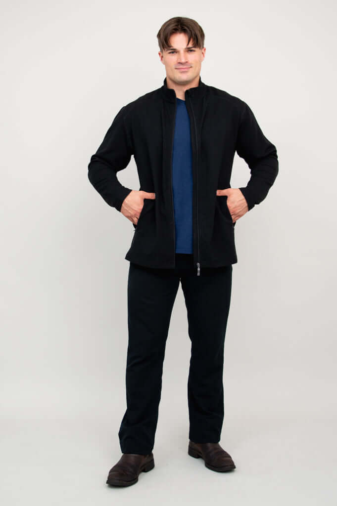 Man showing open black fleece jacket over blue shirt