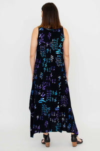 Back view of the Maria Dress, featuring abstract blue and purple design