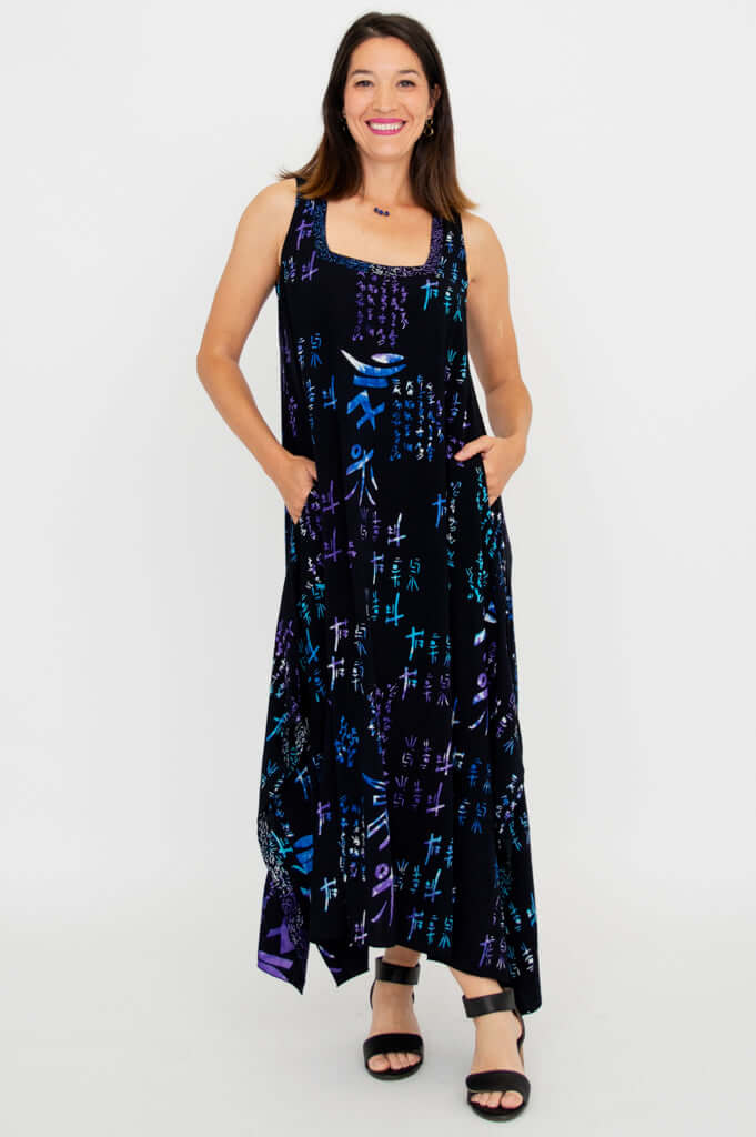 Front view of woman wearing Maria Dress with abstract blue and purple pattern