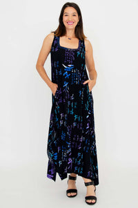 Front view of woman wearing Maria Dress with abstract blue and purple pattern