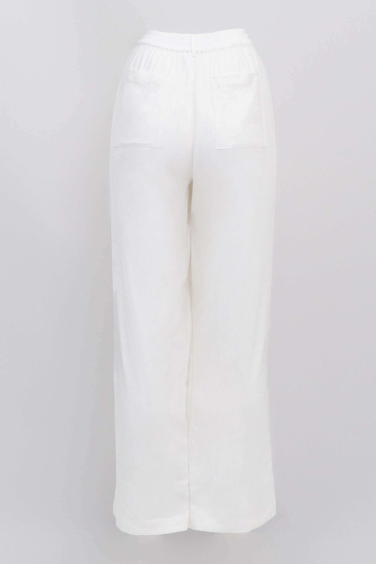 Melodie Pant in white linen blend displayed against white background, back view