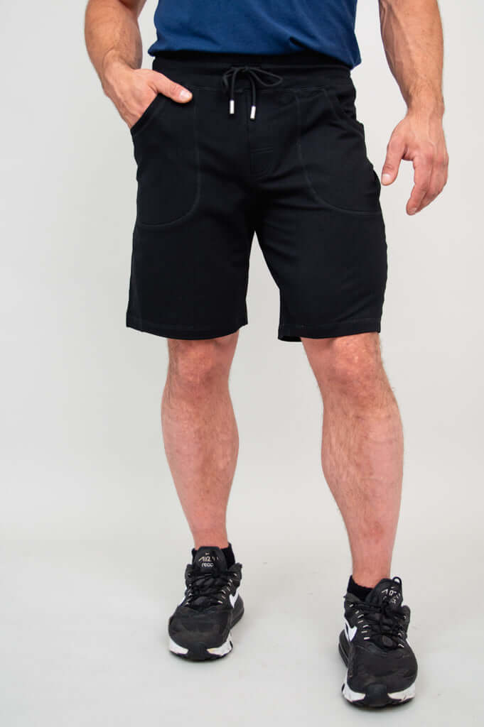 Front view of men's black shorts with drawstring and pockets