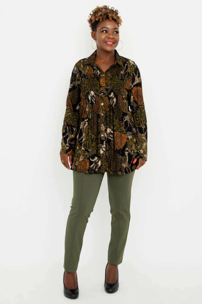 Model facing slightly right, wearing Cindy tunic in safari print and olive pants