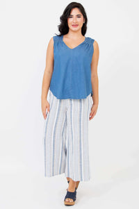 Model front-facing in Landon cropped capris with blue sleeveless top