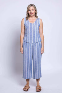 full body front view of woman wearing sleeveless blue stripe top and matching capri pants