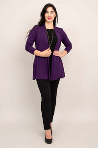 Model posing in a violet bamboo jacket with hands on hips, view from the front