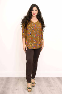 Model in Jackie V-Neck floral bamboo top standing with relaxed pose