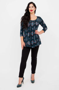 Model displaying Peyton Top in teal paisley print, hands by sides, showing relaxed fit