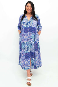 Model wearing a blue and purple paisley print bamboo linen maxi shirt dress