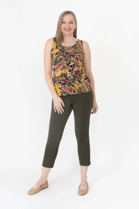 Woman modeling a marigold batik print sleeveless tank top, fashion pose, front view