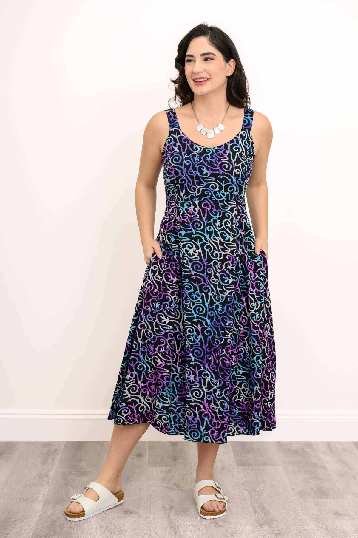 Front angle view of Shauna dress, model smiling, hands in pockets