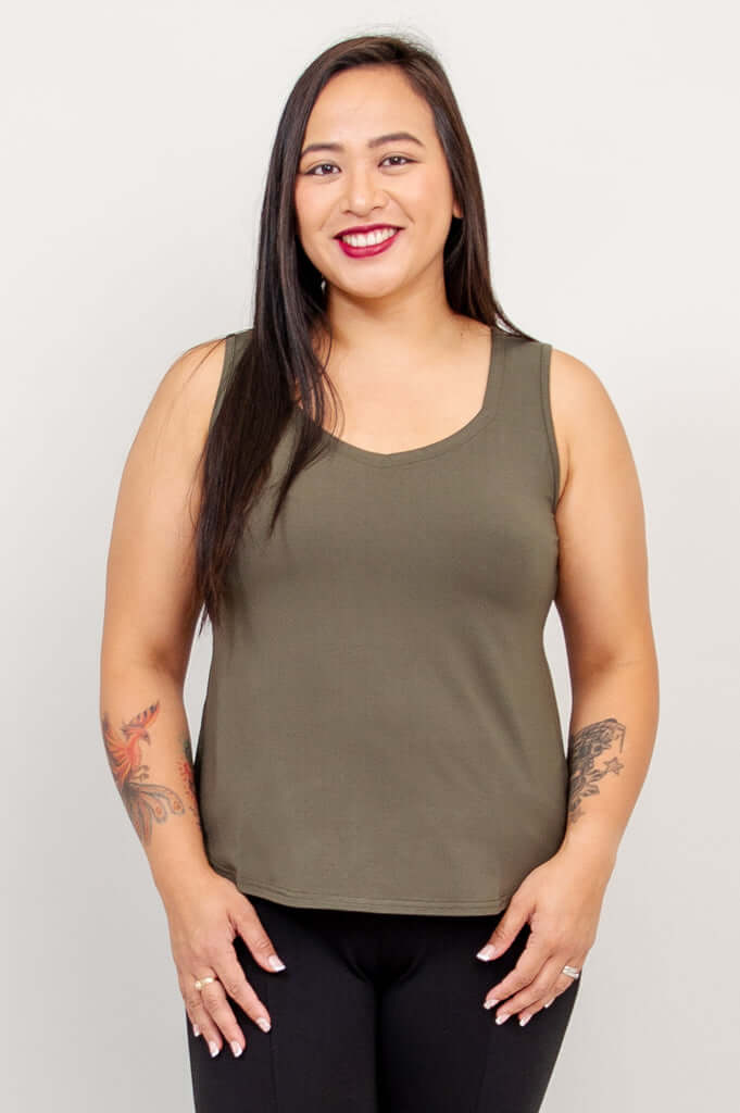 Model wearing olive green Ritzy bamboo tank top, front view