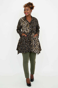 Model with hands in pockets in Laney Blouse – Black Gold Abstract