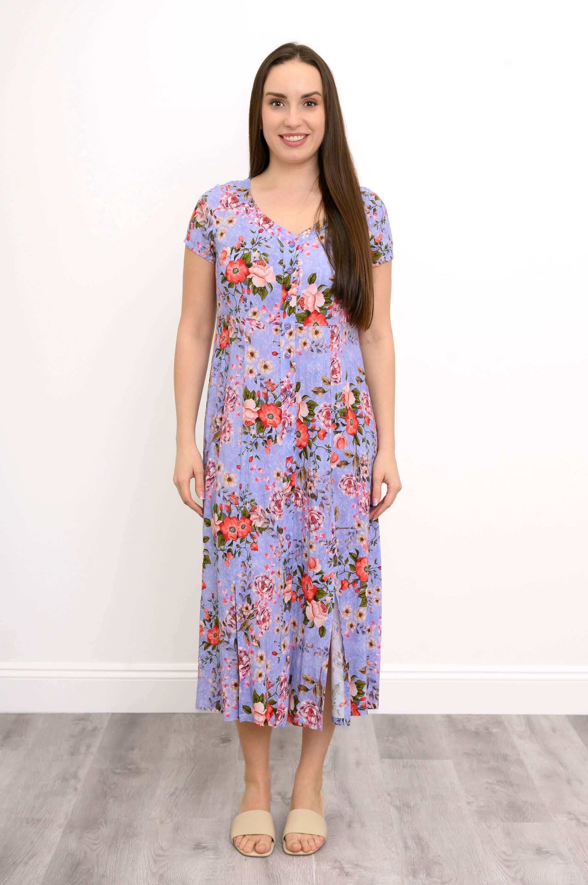Full front view of lilac floral midi dress with short sleeves and floral pattern