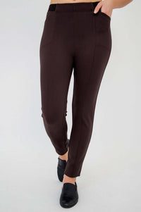 Close-up of Nadia slim-line pants in brown with hidden pockets and seam detailing