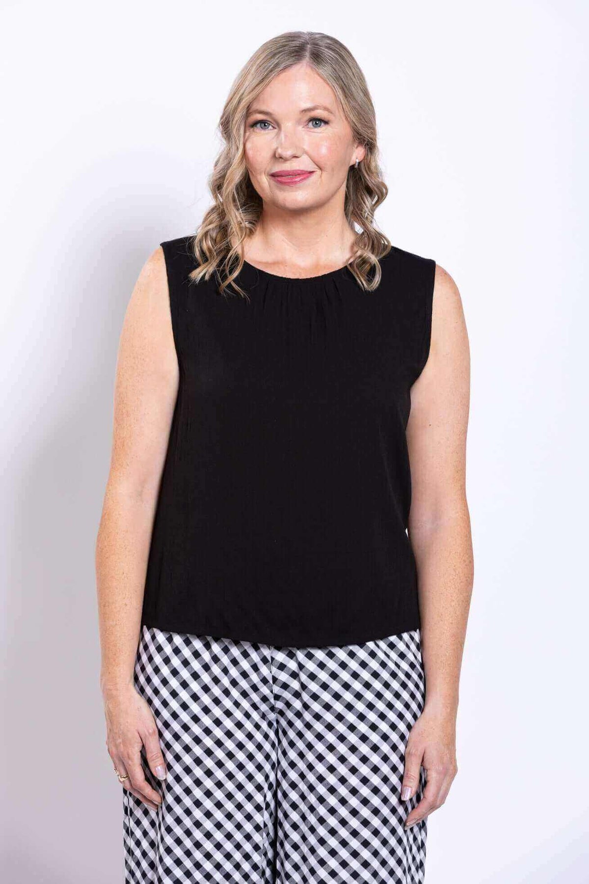 Nina tank close-up showing round neck and sleeveless cut