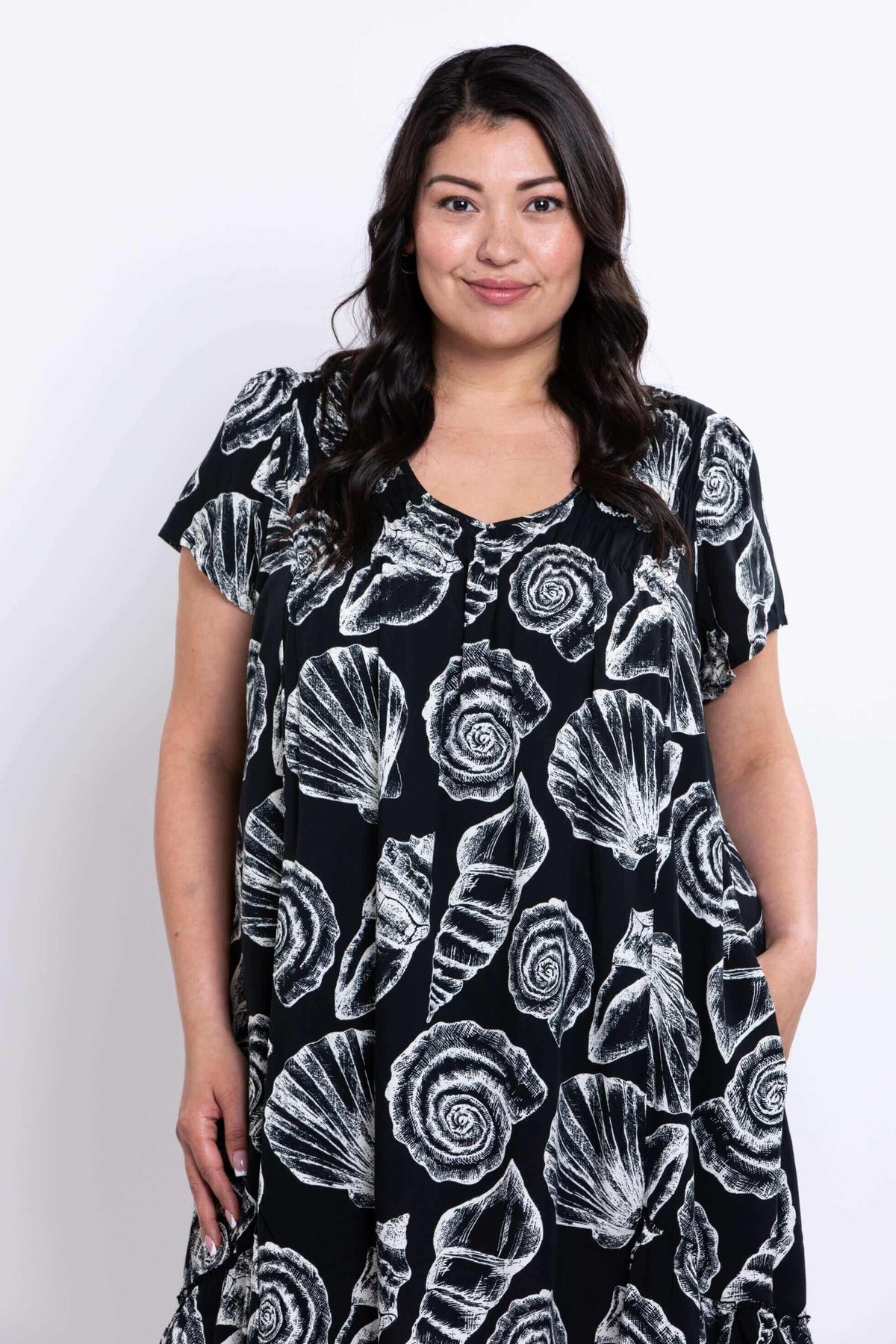 Upper front view highlighting bust gathers and ruffles of Noosa Dress