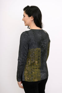 Back view of a relaxed-fit green patterned long-sleeve bamboo top showing the straight hemline and coverage.