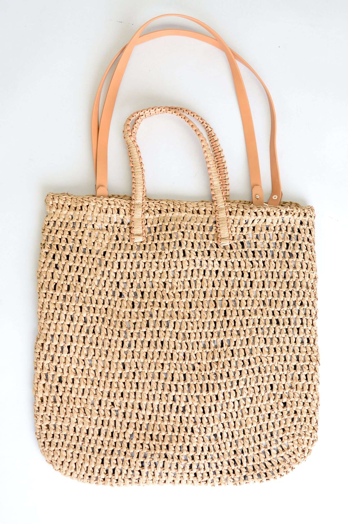 Rattan shopper bag with two short rattan-leather handles and two long leather shoulder straps