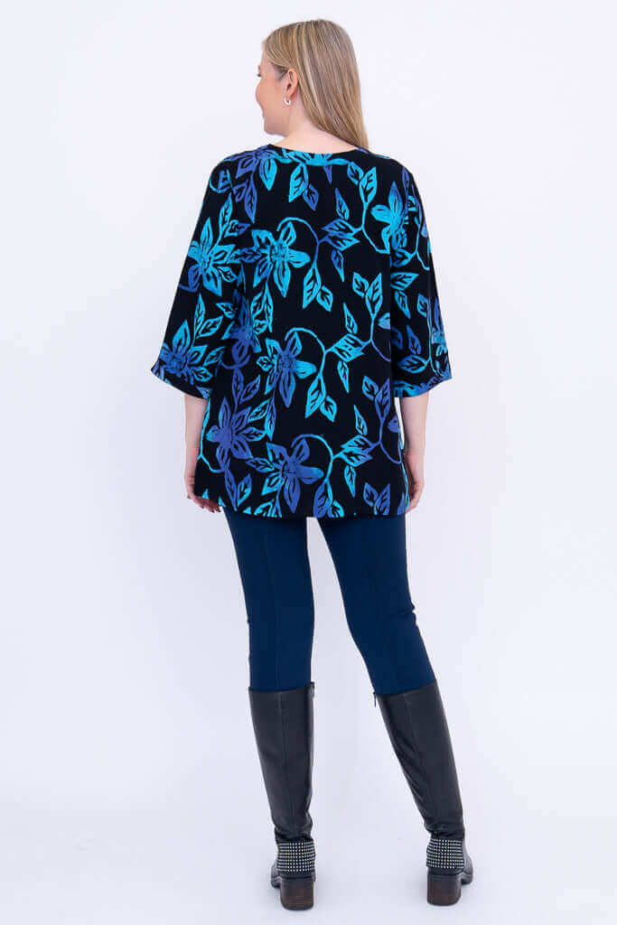 Back view of the Evelyn Top displaying the blue floral design