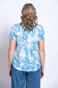 Back view of blue watercolor bamboo tee showing rounded hem and short sleeves