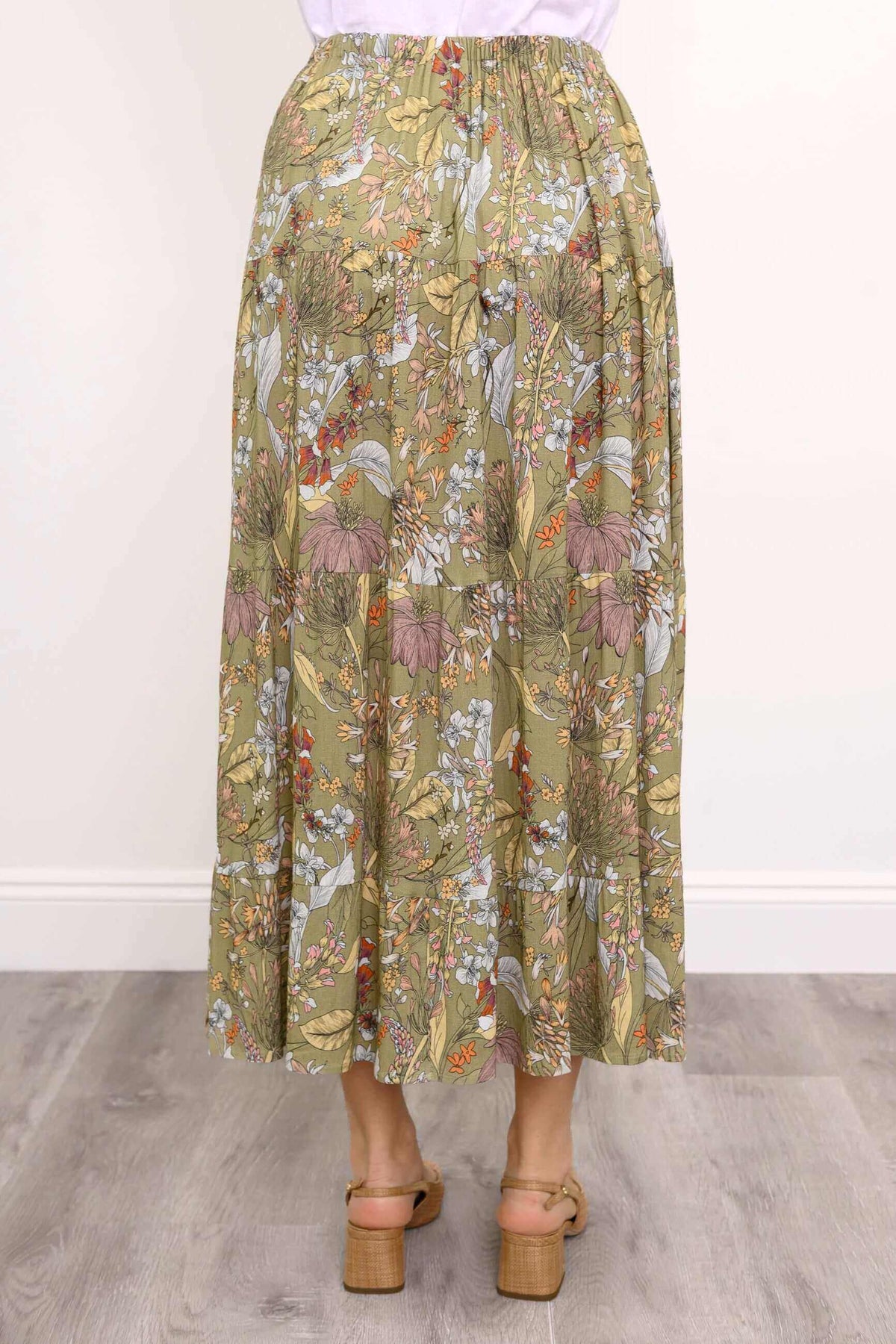 Roma skirt back view, showcasing floral design and elastic waistband