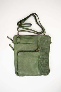 Sage green leather crossbody bag with woven accent and zipper compartments