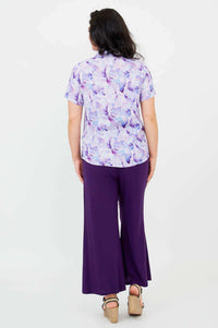 Back view of Samantha short sleeve watercolor linen shirt on model
