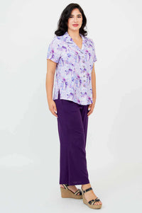 Side view of model in Samantha watercolor bamboo-linen shirt