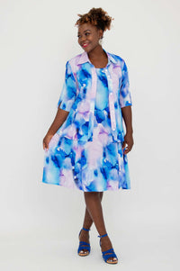 Model wearing blue watercolor Sara dress and matching button-up top