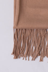 Women's beige cozy warm scarf.