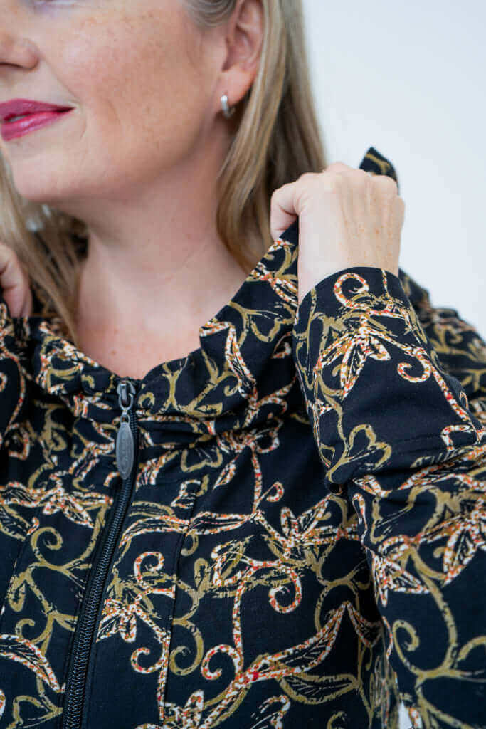Closeup of Seymour Hooded Jacket cowl neck and zipper