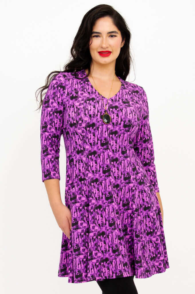 Close-up side angle of Wilma Tunic in Violet Brush print with model smiling