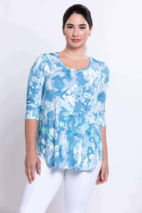 Side front view of model wearing blue watercolor Jazz Top
